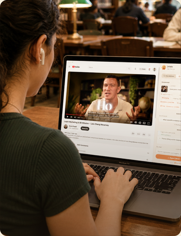 A student in a library taking notes beside a video with the Jotato sidebar open.
